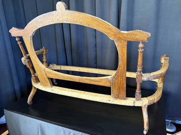 The back of an antique French settle