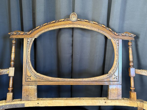 Beautiful carvings on an antique french settle