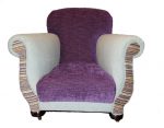 1940's Curvy Armchair 1940's Curvy Armchair, with purple back and seat, funky stripy front facings, and light blue arms, on original castors.
