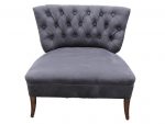American deep-buttoned chair for Ashleigh in Llangeitho. Large American deep-buttoned chair covered in grey faux suede.