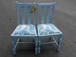 Pair of painted utility chairs. Pair of drop-in utility chairs, painted and covered in a blue-toile fabric.
