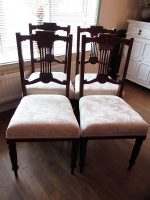 Set of ornate dining chairs. Set of 4 ornate dining chairs covered in a 'putty' brocade fabric.