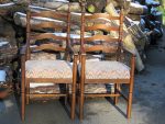 Pair of ladder back chairs. Pair of turned wood ladder back chairs with new modern upholstery.