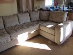 Static caravan upholstery Large static caravan reupholstered in a 2 fabric design, plain on the arms, pattern on cushions.