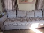 Static caravan upholstery Large static caravan reupholstered in a 2 fabric design, plain on the arms, pattern on cushions.