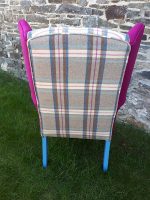 Gorgeous bright & bold refurbished armchair (back). Gorgeous bright & bold refurbished armchair, with sentimental 'Welsh carthen', matching 'magenta, and vibrant blue paintwork (back).