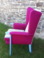 Gorgeous bright & bold refurbished armchair (side). Gorgeous bright & bold refurbished armchair, with sentimental 'Welsh carthen', matching 'magenta, and vibrant blue paintwork (side view).