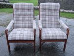 A pair of tartan button-backed upright chairs. A pair of button-back upright chairs covered in a biscuit coloured plaid fabric.