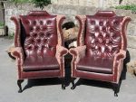 Pair of Leather Chesterfield Chairs Pair of Leather Chesterfield Chairs, refurbished using original leather and conplimentary fabric.