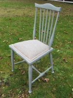 A pin-stuffed spindle chair. Country furniture - a pin-stuffed spindle painted chair.