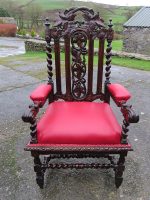 Majestic Throne Chair Majestic Throne Chair with traditional upholstery and covered in Carmine red faux leather (no.3 of 3).