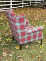 Parker Knoll Wingback Armchair. Parker Knoll Wingback Armchair covered in cherry/green tartan fabric (side/back view).