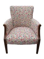 Ornate Peru-inspired armchair for Nonna in Abersytwyth Ornate armchair with inlaid woodwork and Peru-inspired fabric.