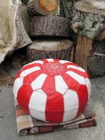 Leather pouffe. Leather pouffe filled with wood shavings from the workshop.