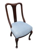 Queen Anne style bedroom chair. Repro Queen Anne style bedroom chair with modern upholstery.