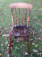 Wooden refurbished chair. An old wooden chair refurbished to give a new lease of life.