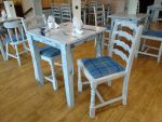 Reupholstered tartan chairs. Reupholstered chairs for a new eatery at 'Woodlands Caravan Park', New Quay.