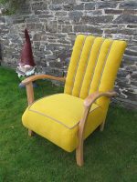 Fluted Bentwood armchair. Fluted Bentwood armchair covered in a vibrant sunflower yellow with contrasting grey rope-braid.