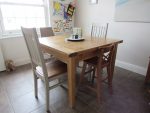 Refurbished dining table. Dining table - original finish removed and varnished for durability.