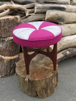 Carousel pouffe / footstool. for Heather in Cribyn. G-Plan circular footstool, with vibrant magenta and silver carousel.