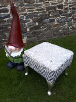 Pewter-painted footstool. Pewter-painted footstool with silver/grey zigzags.