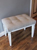 Dressing table stool. Dressing table stool with painted legs and shallow-buttons.