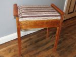 Refinished piano stool. Refinished piano stool with horizontal autumnal stripe.