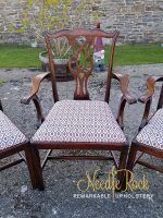 Set of dining chairs covered in a striking geometric design complimenting the wood. Set of dining chairs covered in a striking geometric design complimenting the wood.