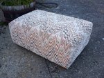 Large pouffe in retro fabric. Large pouffe covered in nostalgic and retro fabric.