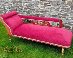 A classic Edwardian Chaise with gold decoration.