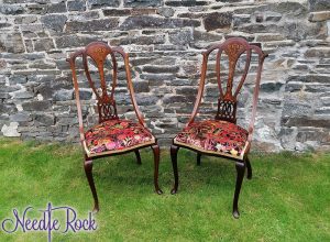 A pair of pin-stuffed chairs in a fabulous F&P Interiors printed velvet fabric.