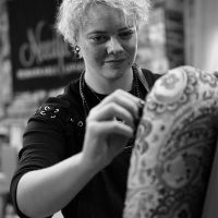 Jason working on an upholstered armchair in the Needle Rock workshop