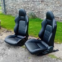 Two new seats recovered in hard-wearing black vinyl.