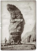 About Us: The 'Gulls Needle' rocky pillar on Llanrhystud beach, photographed in 1903, inspiration for the Needle Rock name: Needle Rock
